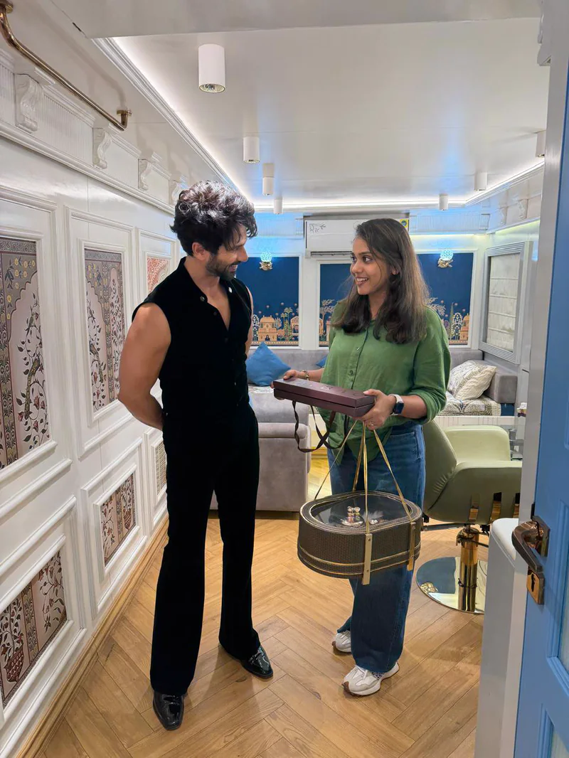 A celebrity guest receiving a Maybac hamper