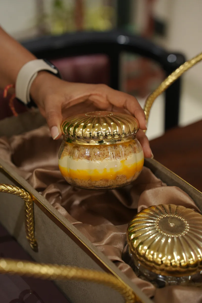 A gold dessert jar lifted from a Maybac hamper