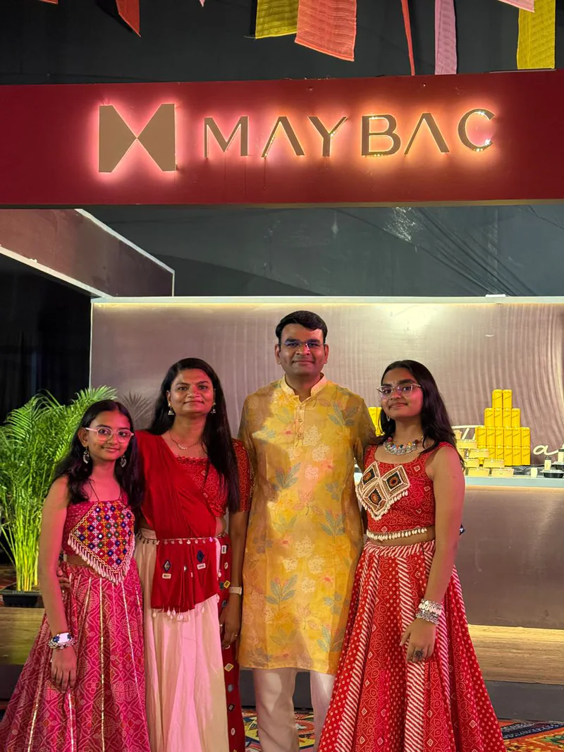 Family at the Maybac Navratri stall