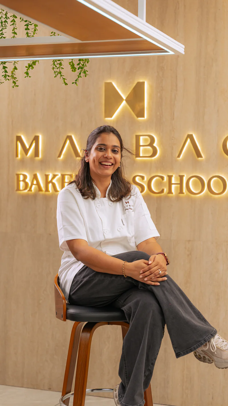 Rutu Kachadiya seated in the Maybac Bakery & School